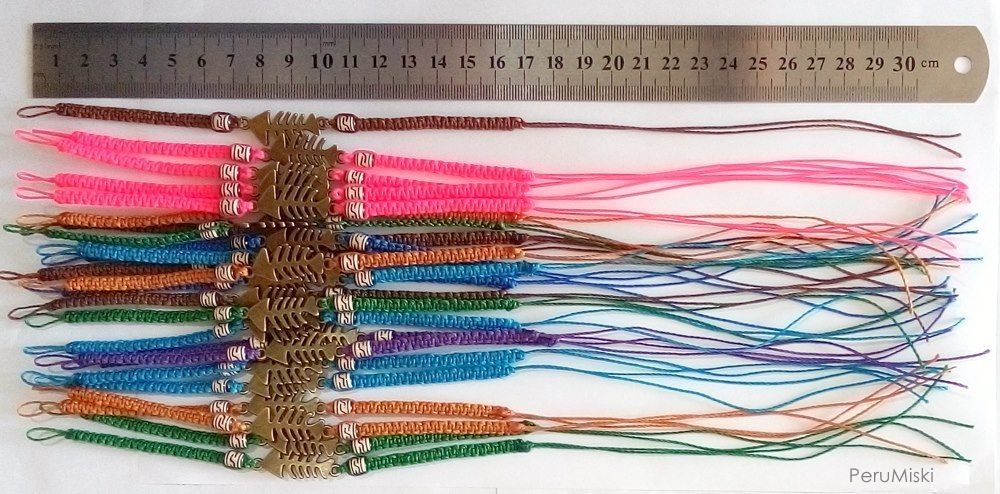 Bracelets anklets with fishbone charms, waxed thread