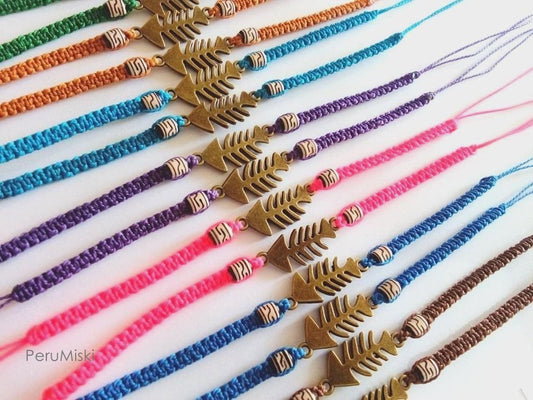 Bracelets anklets with fishbone charms, waxed thread