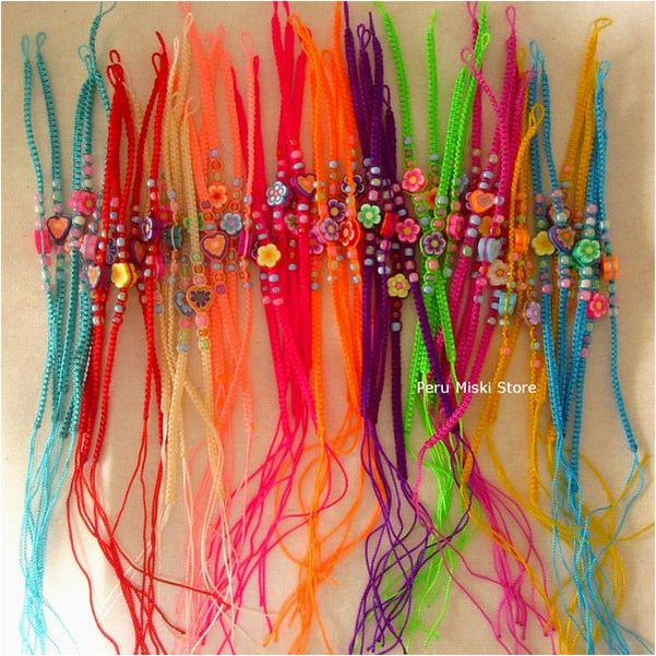 Friendship Bracelets with fimo flowers and hearts
