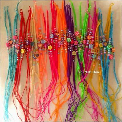 Friendship Bracelets with fimo flowers and hearts