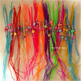 Friendship Bracelets with fimo flowers and hearts