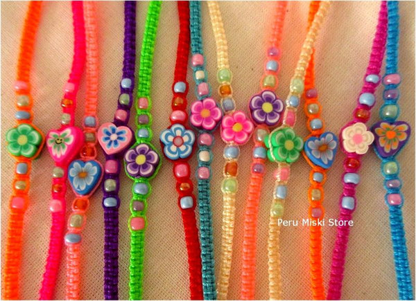Friendship Bracelets with fimo flowers and hearts
